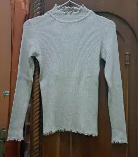 Kaos rajut wanita