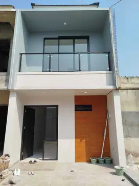 RUMAH MODERN 2 LANTAI DALAM CLUSTER 4 MENIT TOL JORR BEBAS BANJIR