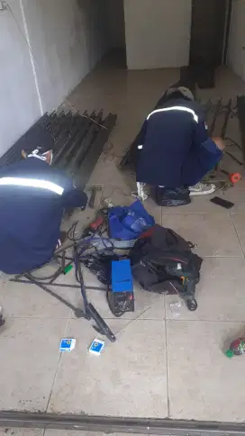 Tukang benerin pintu rolling door folding gate murah depok