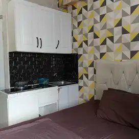The green apartment pramuka city studio mall