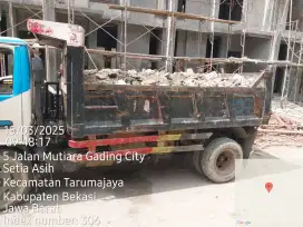 Buang puing sampah peroyek
