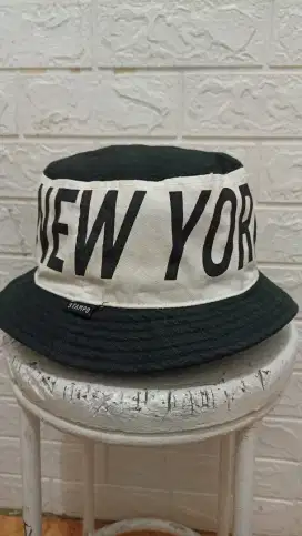 Topi bucket dan Rimba