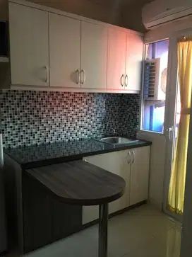 Apartemen the green pramuka city studio furnish tower