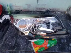 Lampu depan glory 560