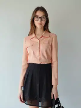 Atasan wanita lengan panjang.