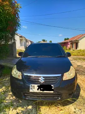 Dijual mobil suzuki neo baleno 2009