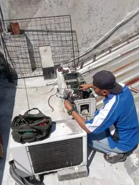 SERVICE AC BONGKAR PASANG AC
