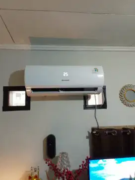 AC Sharp 1/2 pk like new beli baru 3minggu