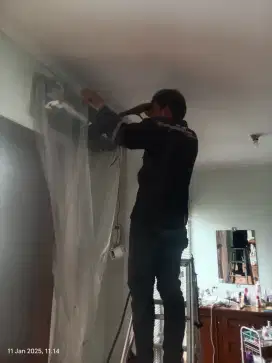 Teknisi AC dan Kulkas