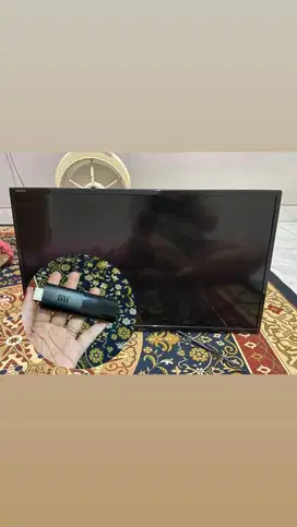Tv sharp 24 inc dan MI TV Stick
