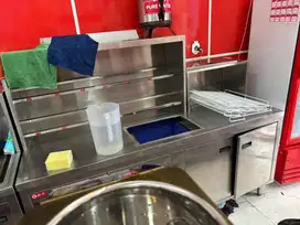 Meja stainless topping