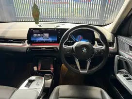 BMW X1 2024 HITAM