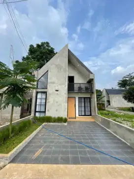 Rumah estetik 1,5 lantai terlaris didepok lokasi pinggir jalan utama