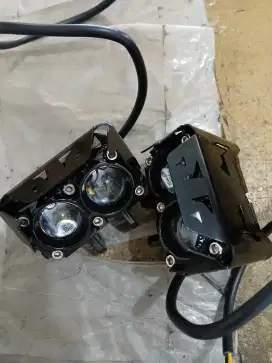 Lampu laser 2 mata warna kuning putih