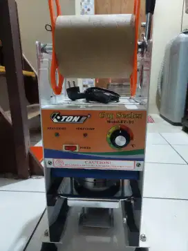 Mesin pres eton