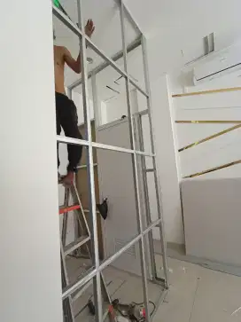 Tukang bangunan perbaikan/renovasi