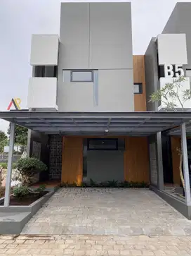 Rumah Tropis dalam Cluster Premier Estate Bambu Apus Cipayung Jaktim