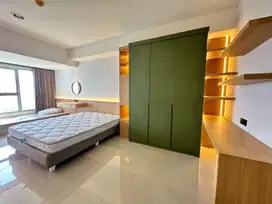 Sewa Apartemen Studio 42m², Orange County Lippo Cikarang, 60 Juta/Thn!