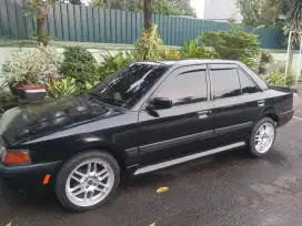 Mobil mazda 323 interplay