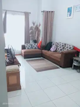 Over kredit rumah