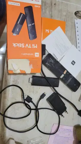 Mi tv stick merubah tv biasa ke smart tv