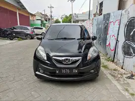 DP 9 JT BRIO E MANUAL KM 76RB ASLI