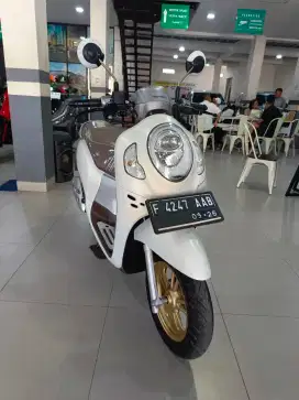 Scoopy obral harga