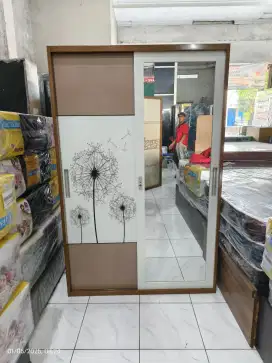Lemari besi pintu geser 120x50x185 motif Madiun kota