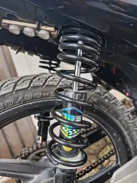 Shock belakang motor bebek