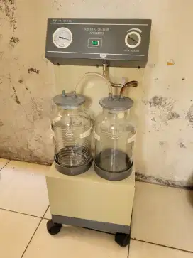 Mesin suction air medis . Mesin vakum medis