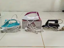 Setrika baju uap