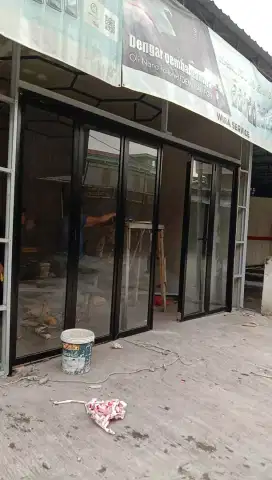 Pintu lipat aluminium kaca