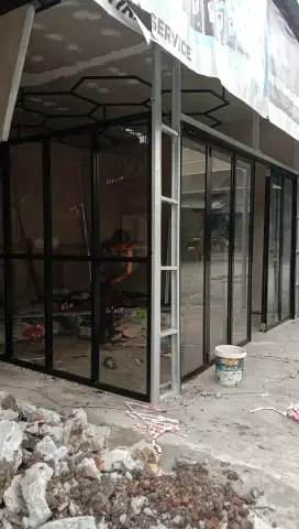 Pintu lipat aluminium kaca
