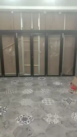 Pintu lipat aluminium kaca