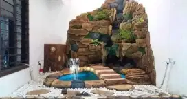 Kolam relif air terjun