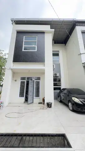 sewa kan rumah cluter area jl pemuda riau dekat sekolah darma dan psar