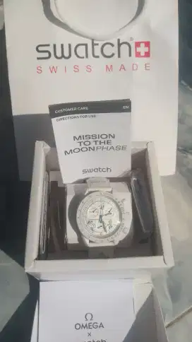 Omega swatch omega Snoopy Moon Phase