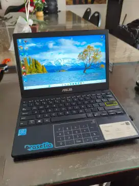 Laptop intel Celeron Asus e210m bekas cod bandung