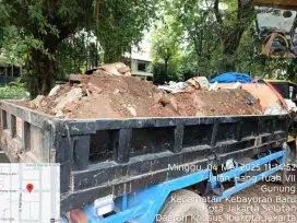 Jasa buang puing dan pengurugan tanah