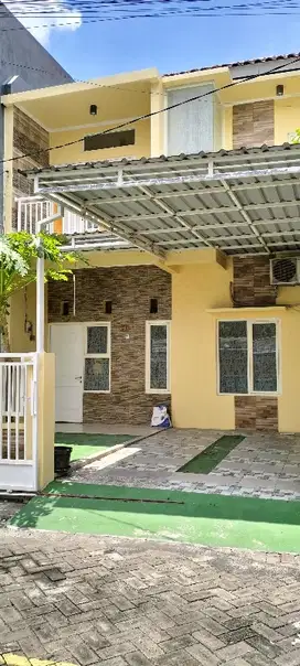 Rumah cantik 2 lantai luas Wiguna DP minim