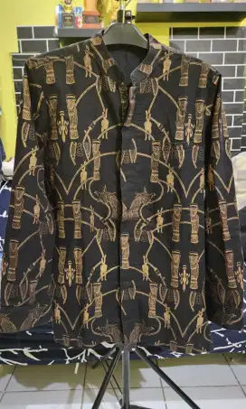 Kemeja kerah batik khas papua