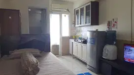 Apartemen the green pramuka city studio Furnish