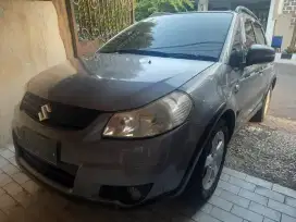 Suzuki x over sx4 2010 manual
