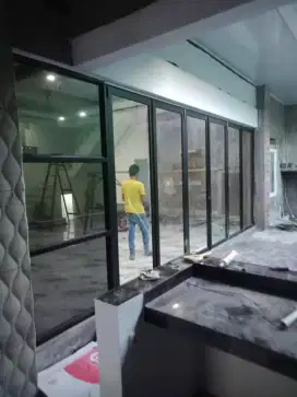 Pintu lipat kaca sekat partisi kaca