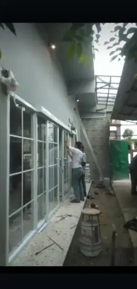 Tukang dan knek bangunan