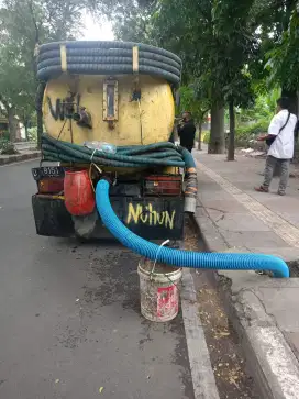 Tukang saluran mampet