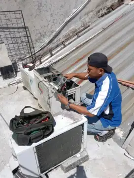 SERVICE AC BONGKAR PASANG AC