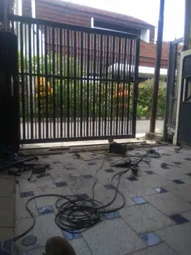Pembuatan pintu pagar kanaopi tralis