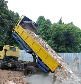 Jasa urugan puing/tanah dll
