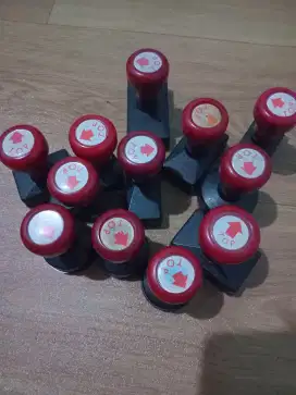 Stempel top berbagai macan bentuk
